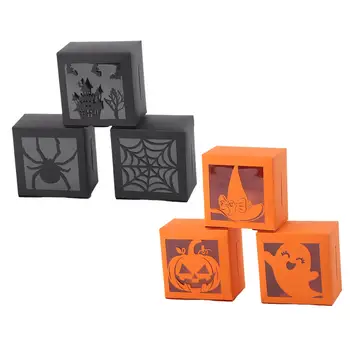 6 коробок шоколада, печенья и сувениров для вечеринки в честь Хэллоуина.